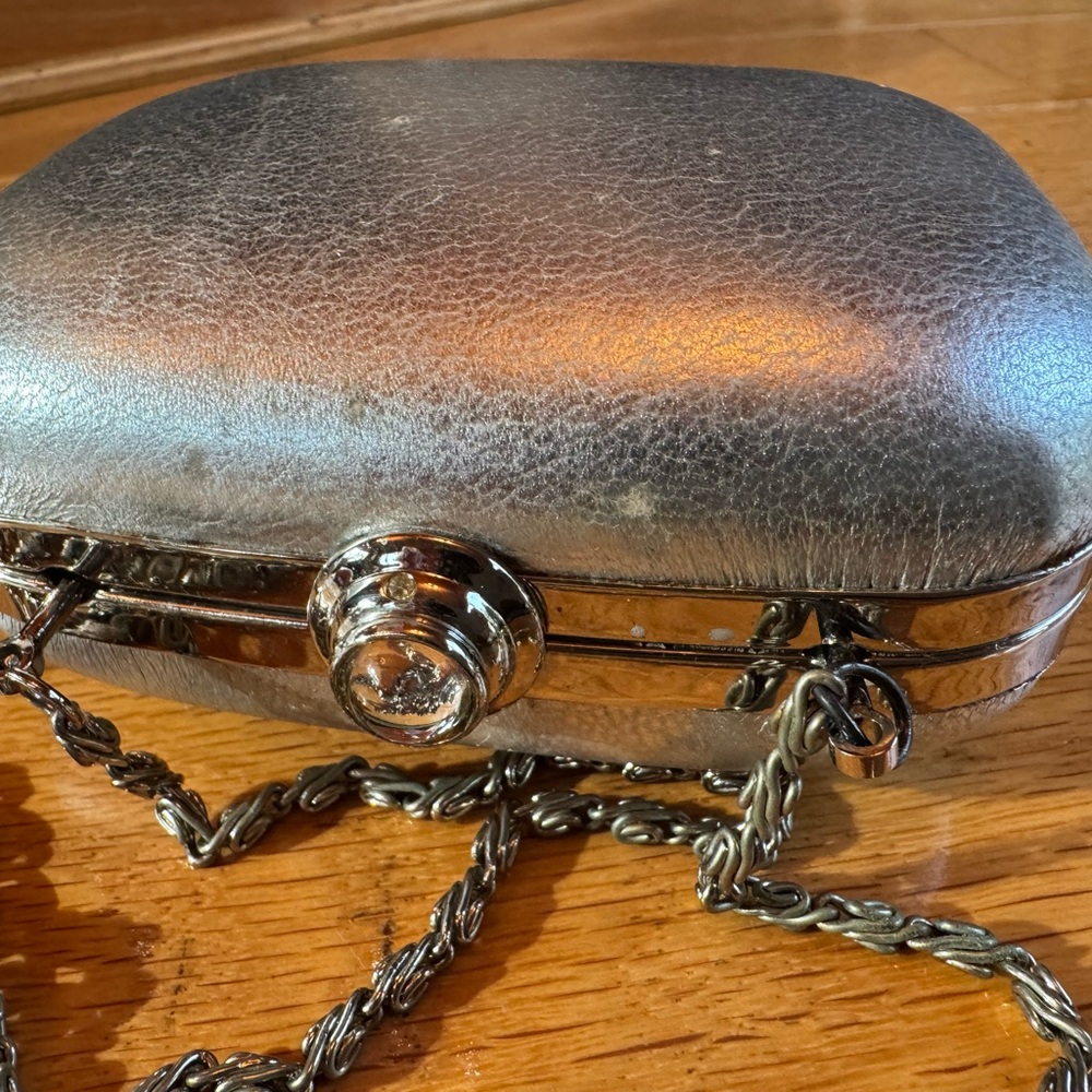 Elegant Silver Textured Clutch with Crystal Clasp